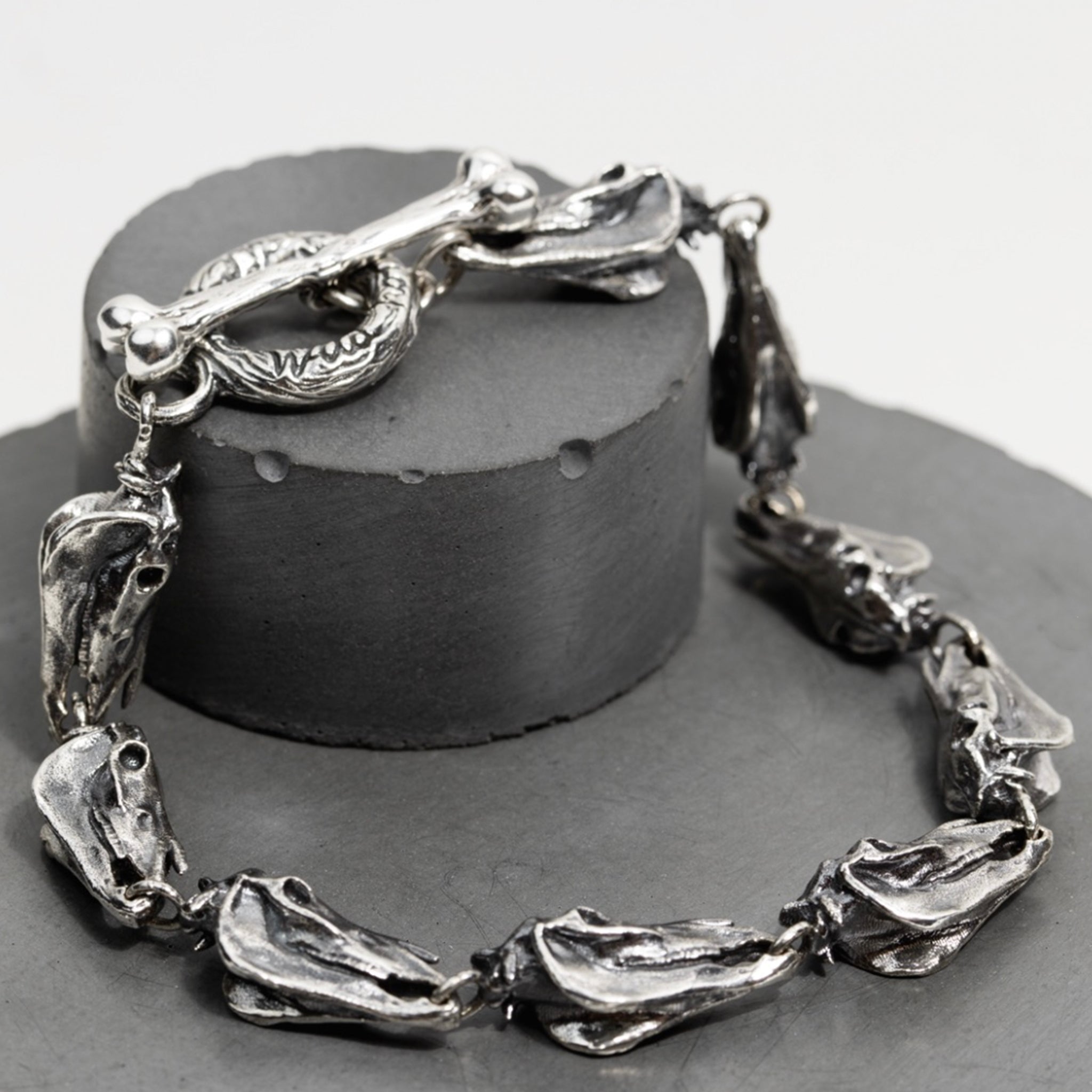 Product image of women's jewelry in the Last Ride Collection, such as silver bracelet and a silver horse bracelet.