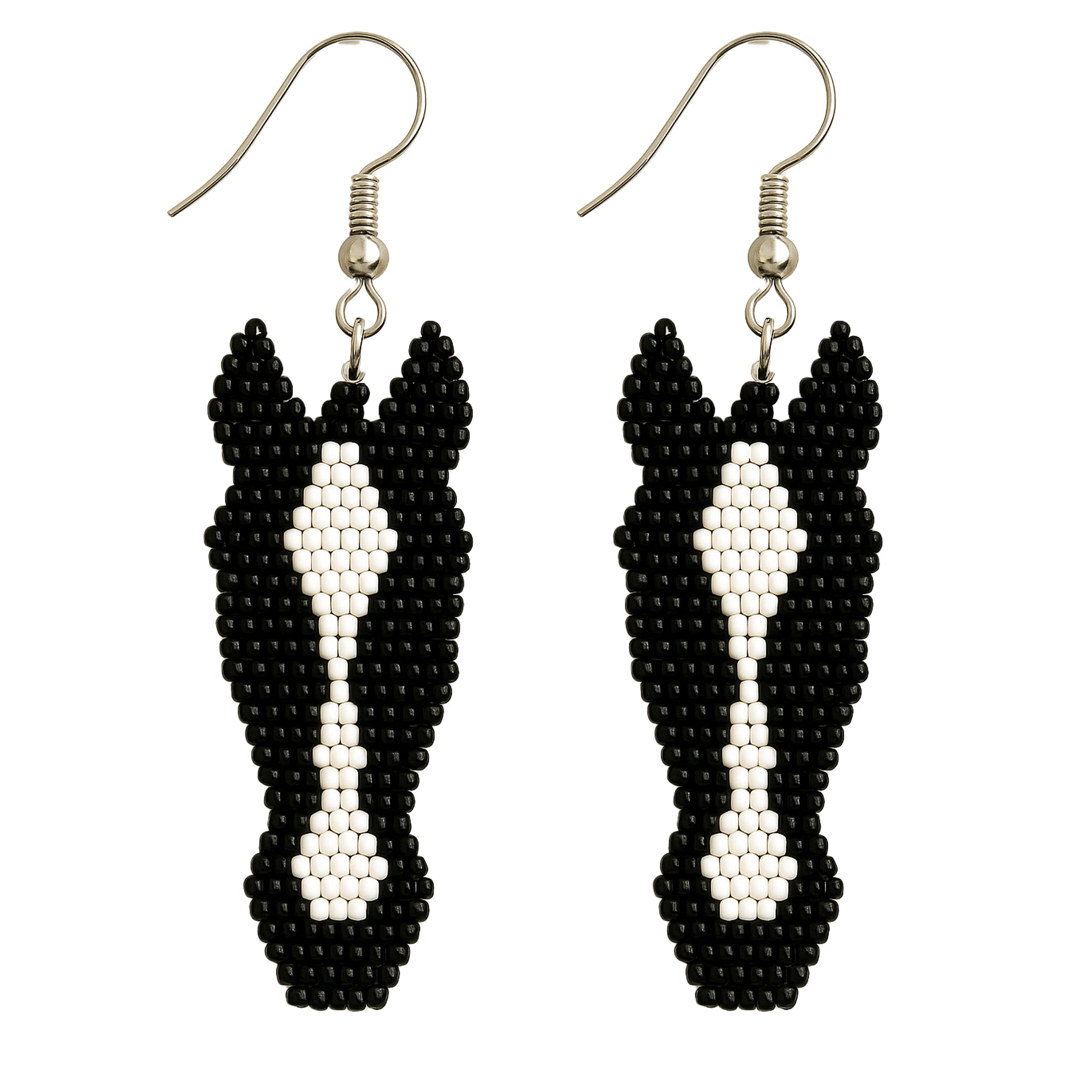 Detailed photo of the beadwork on the all-black and white horse head earring, highlighting the texture of an unique piece