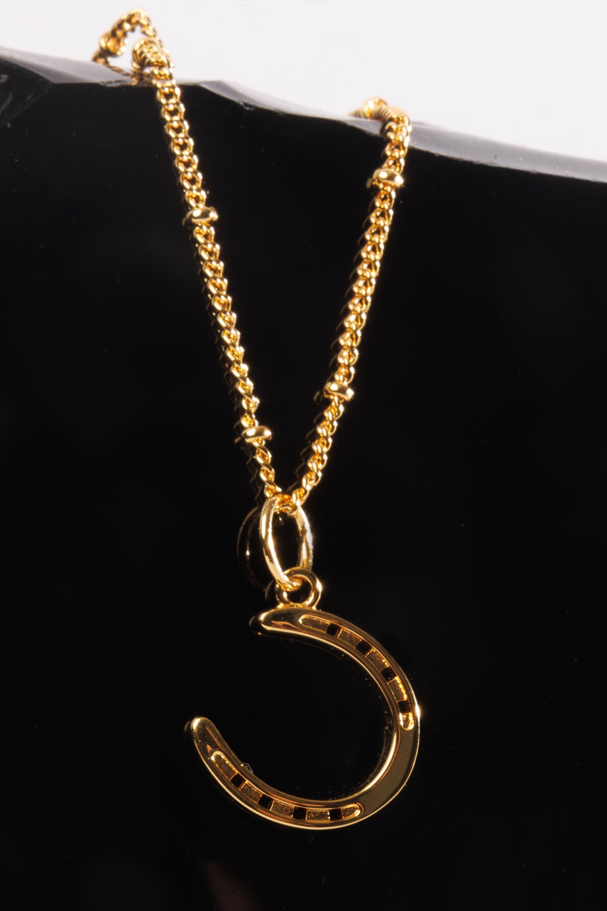The Luck Always Gold Horsehshoe Pendant