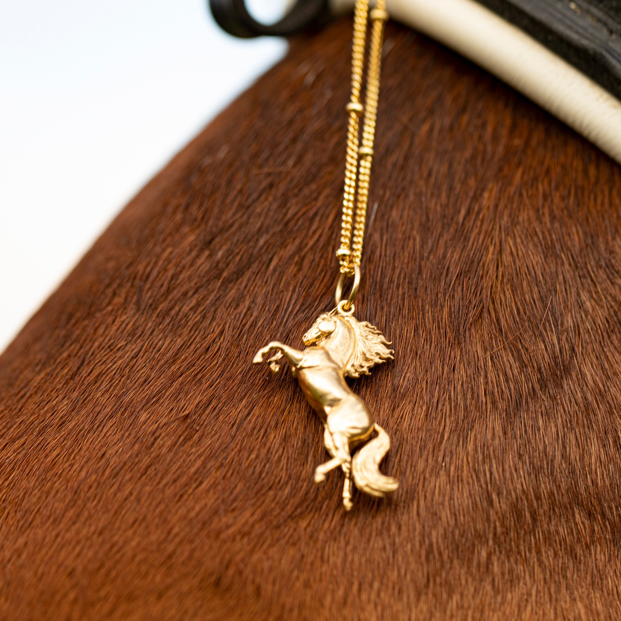 The Wild Flame Rearing Gold Horse Pendant