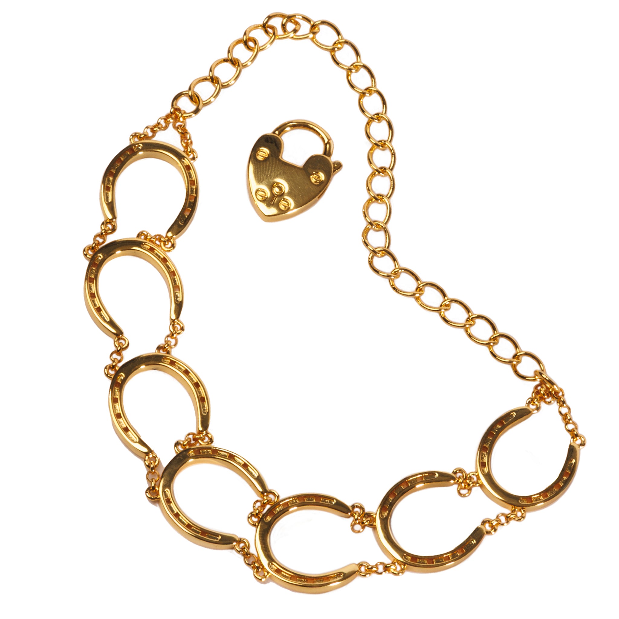 A stunning horseshoe bracelet laid out on a white background, highlighting its lucky design and symbolic horse jewelry details.
