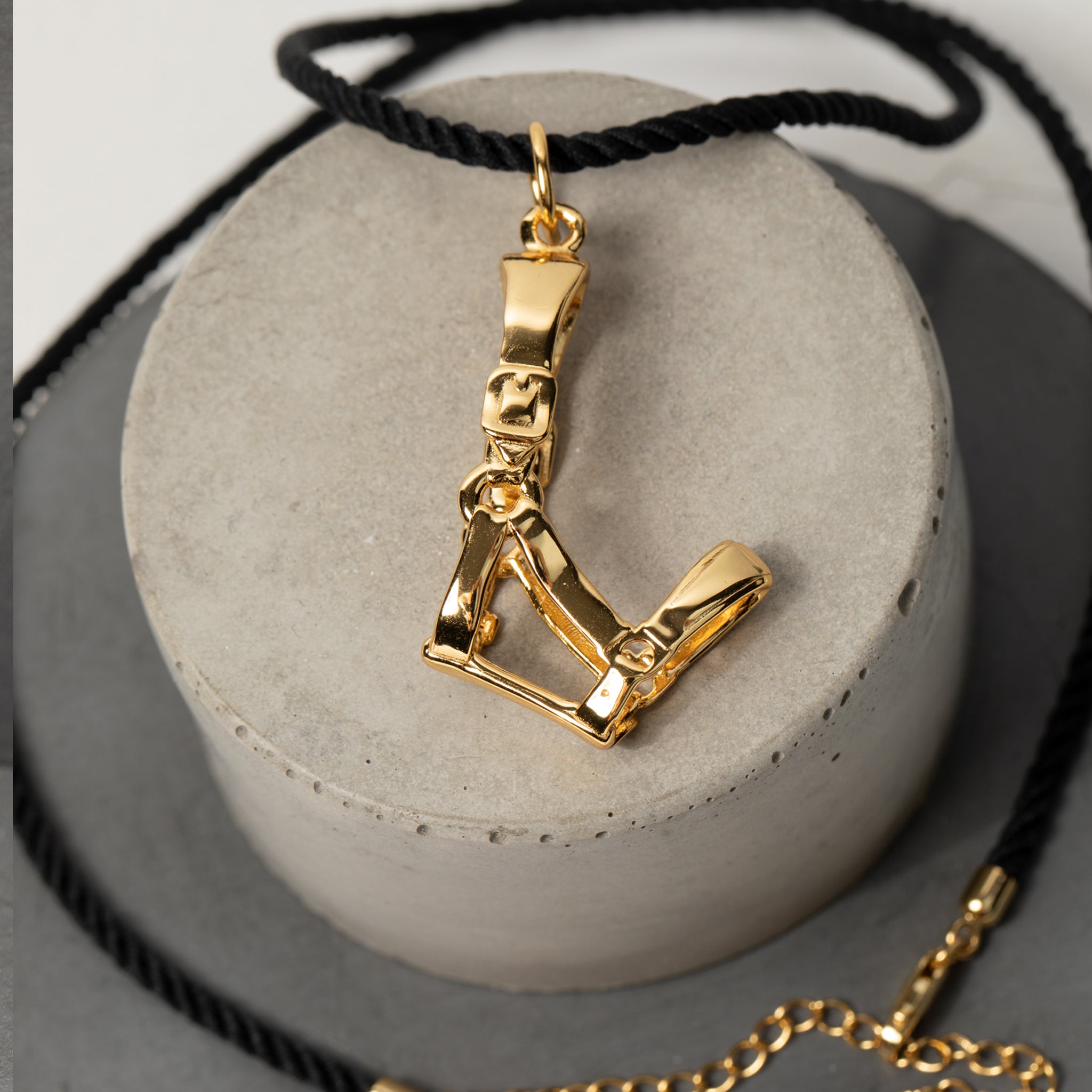 Head Collar and Rope Necklace in polished gold, a sophisticated pendant necklace and stylish equestrian gift for women.